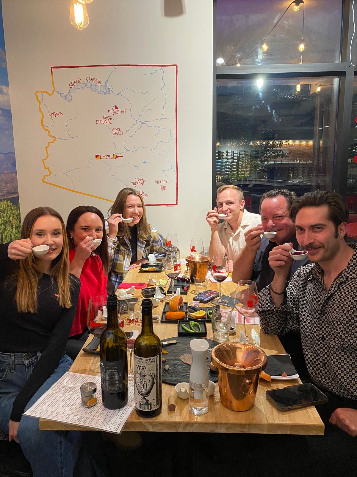 Participants enjoy a Wine & Cheese Workshop in Scottsdale, learning essential pairing techniques.